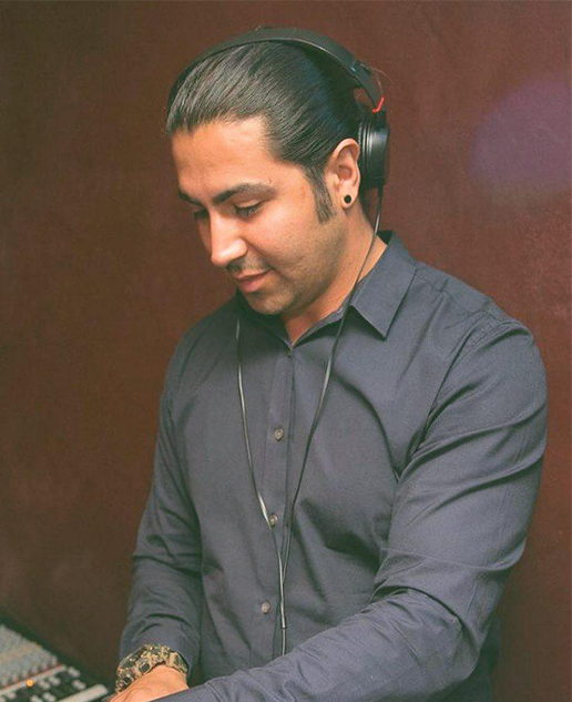 DJ General MJ Armstrong performing at a mixing console